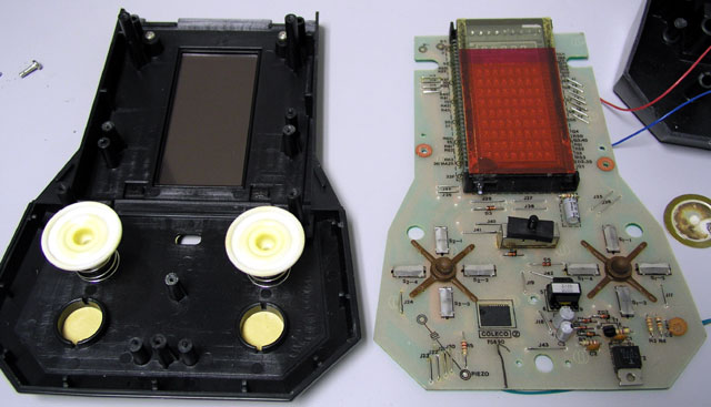 File:Coleco Pac-Man Mini-Arcade opened, board and front case.jpg