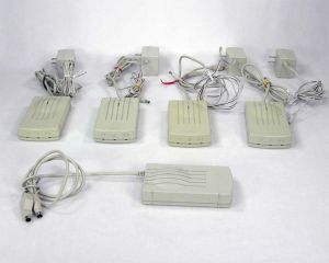 TelePort modems and power adapters, with the Bronze for Performa at the front