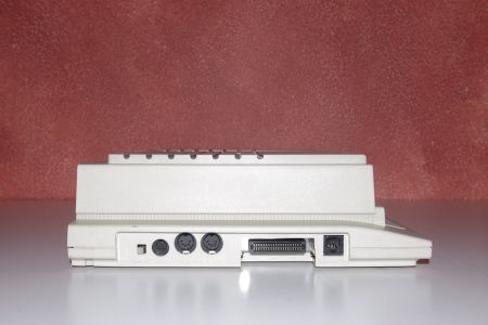 Left side: reset, LAN, MIDI, cartridge and keyboard sockets
